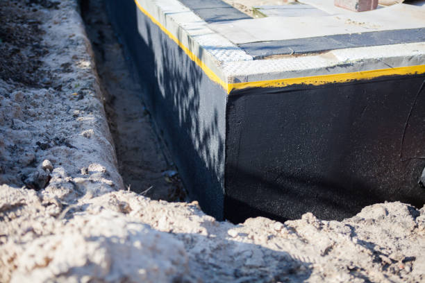 Professional Interior Drainage System technician working in Lowell, IN
